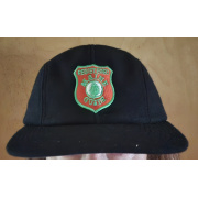 wool_cap_on_head_brown_background